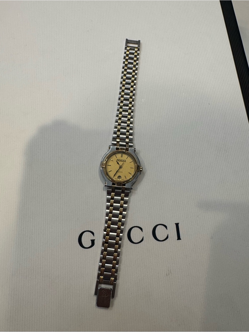 Authentic Gucci Two-Tone Silver and Gold Round Dial Bracelet Watch